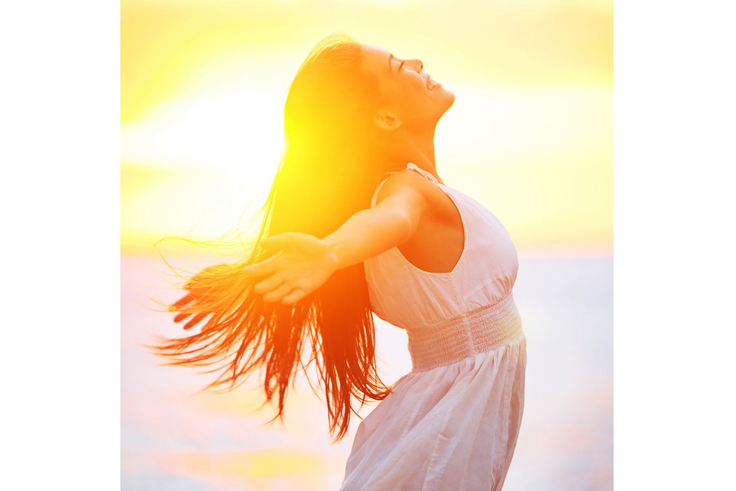 person-woman-on-the-beach-under-setting-sun